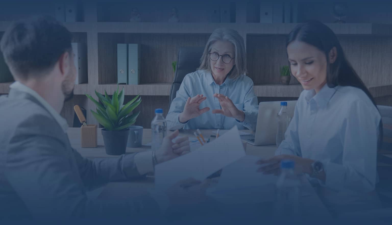 A happy elderly man embracing his son