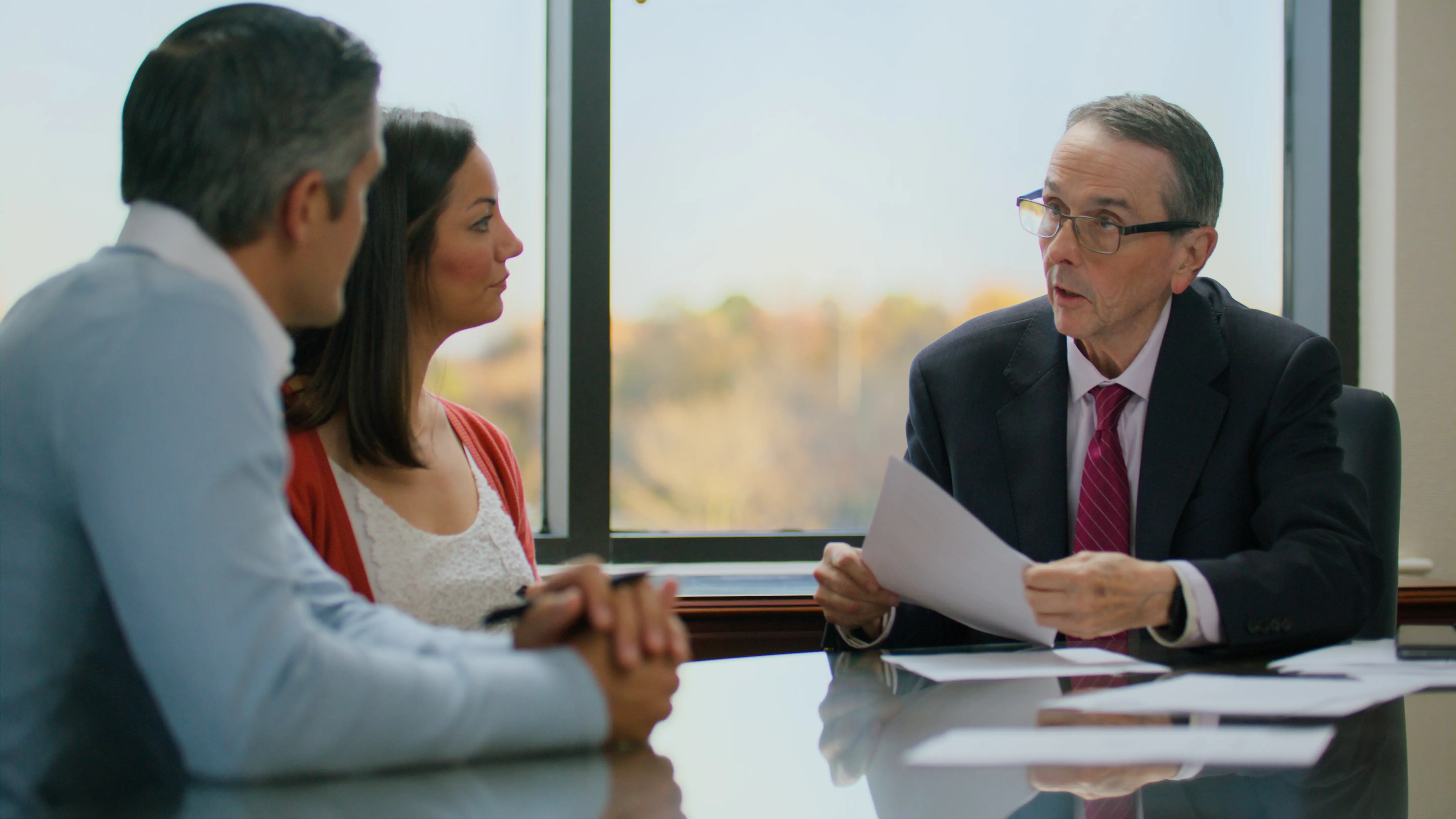 Woman looking comfortable holding tea cup in living room.
